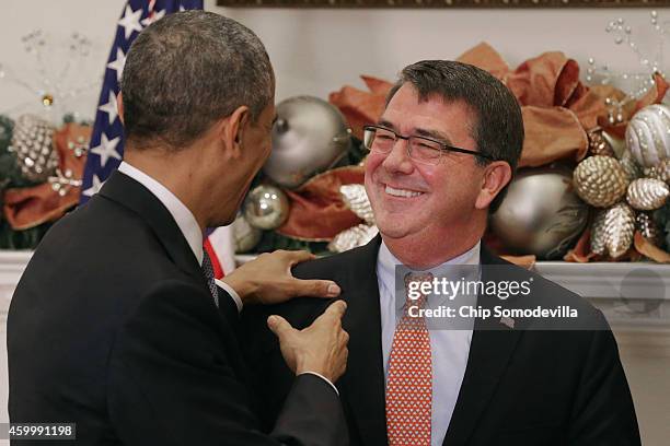 President Barack Obama jokes with Ashton Carter after Obama announced his nomination of Carter to be the next defense secretary in the Roosevelt Room...