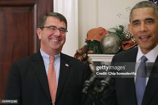 Ashton Carter listens as U.S. President Barack Obama announces his nomination of Carter to be the next Defense Secretary in the Roosevelt Room at the...