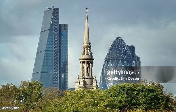 The tower of 122 Leadenhall Street, also known as the Cheesegrater, stands beside 30 St Mary Axe, also known as The Gherkin, in the City of London on...