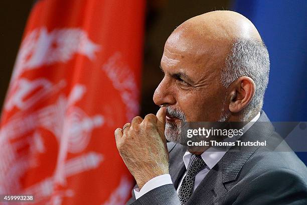 Afghanistan's President Ashraf Ghani speaks to the media after his meeting with German Chancellor Angela Merkel on December 05, 2014 in Berlin,...