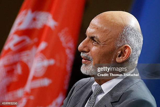 Afghanistan's President Ashraf Ghani speaks to the media after his meeting with German Chancellor Angela Merkel on December 05, 2014 in Berlin,...