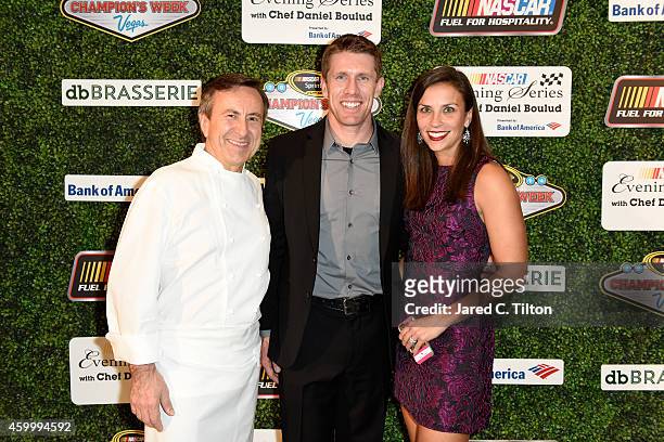 Carl Edwards poses with his wife Kate and Chef Daniel Boulud during the NASCAR Evening Series presented by Bank of America at db Brasserie at The...
