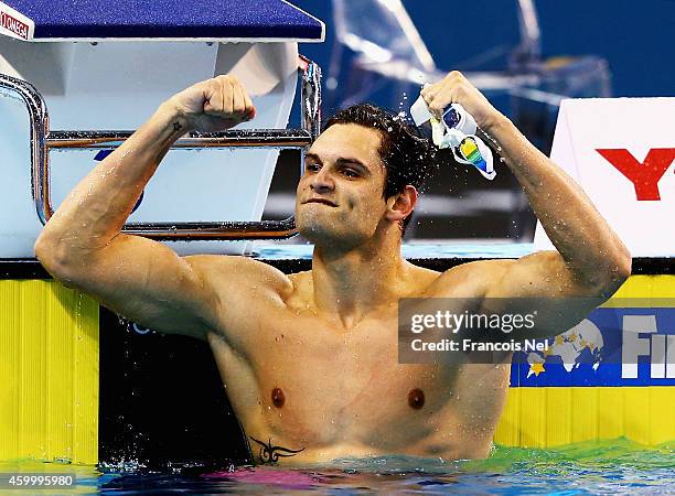 Florent Manaudou of France celebrates after winning the Men's 50m Freestyle Final during day three of the 12th FINA World Swimming Championships at...