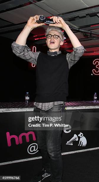 Tom Fletcher of McBusted meet fans and signs copies of their new self titled album at HMV, Oxford Street on December 5, 2014 in London, England.