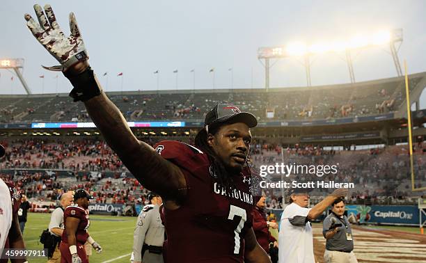 Jadeveon Clowney of the South Carolina Gamecocks walks off the field after the Gamecocks defeated the Wisconsin Badgers 34-24 at the Capital One Bowl...