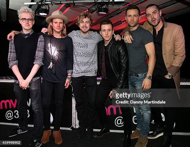 Tom Fletcher, Dougie Poynter, James Bourne, Danny Jones, Harry Judd and Matt Willis of McBusted meets fans and signs copies of their new self titled...