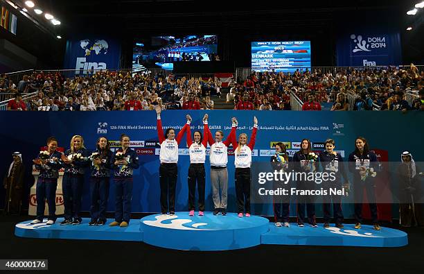 Mie Ostergaard Nielsen, Rikke Moller Pedersen, Jeanette Ottesen, Pemille Blume of Denmark celebrates on the podium after the Women's 4x50m Medley...