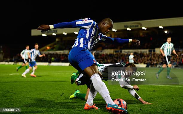 Blyth Spartans player Ryan Hutchinson is challenged by Marlon Harewood of Hartlepool during the FA Cup Second round match between Hartlepool United...