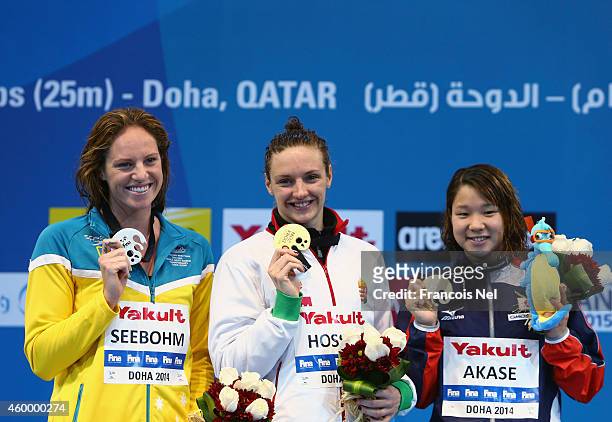 Emily Seebohm of Australia, Katinka Hosszu of Hungary and Sayaka Akase of Japan celebrates on the podium after the Women's 200m Backstroke Final...