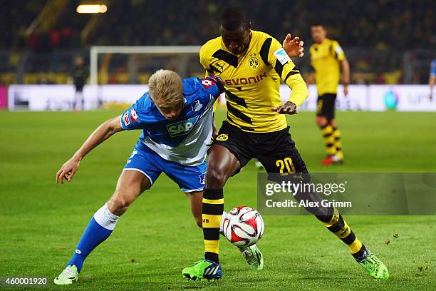 Adrian Ramos of Dortmund is challenged by Andreas Beck of Hoffenheim during the Bundesliga match between Borussia Dortmund and 1899 Hoffenheim at...