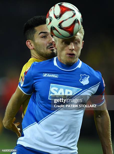 Dortmund's midfielder Ilkay Guendogan and Hoffenheim's defender Andreas Beck during the German first division Bundesliga football match Borussia...