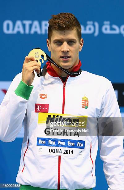 Daniel Gyurta of Hungary celebrates on the podium after winning the Men's 200m Breaststroke Final during day three of the 12th FINA World Swimming...