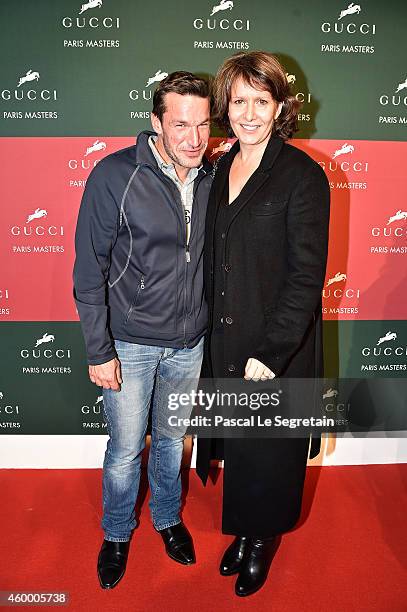 Benjamin Castaldi and Carole Rousseau attend Day 2 of the Gucci Paris Masters 2014 on December 5, 2014 in Villepinte, France.