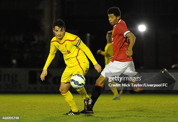 Pedro Chirivella of Liverpool and Devonte Redmond of Manchester United in action during the Barclays Premier League Under 18 fixture between...