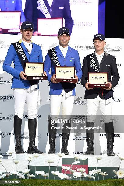 1st place winner Doda de Miranda from Brazil , 2nd place winner Christian Ahlmann from Germany and 3rd place winner Roger-Yves Bost from France pose...