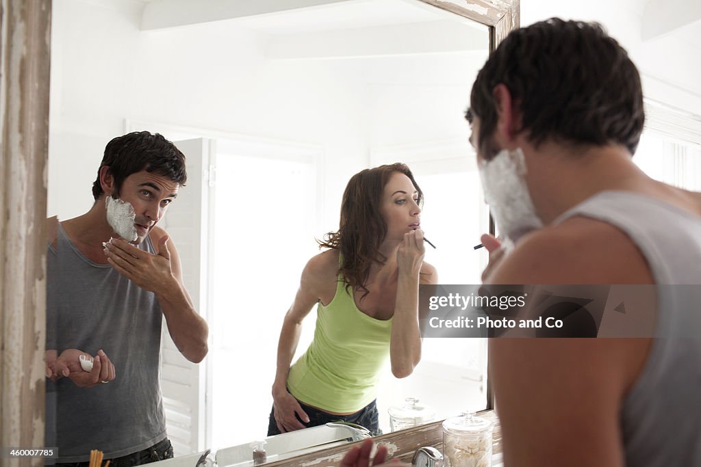 Woman and man in bathroom