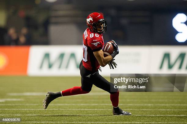 Eric Rogers of the Calgary Stampeders runs with the ball during the 102nd Grey Cup Championship Game against the Hamilton Tiger-Cats at BC Place...