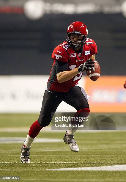 Bo Levi Mitchell of the Calgary Stampeders runs with the ball during the 102nd Grey Cup Championship Game against the Hamilton Tiger-Cats at BC Place...