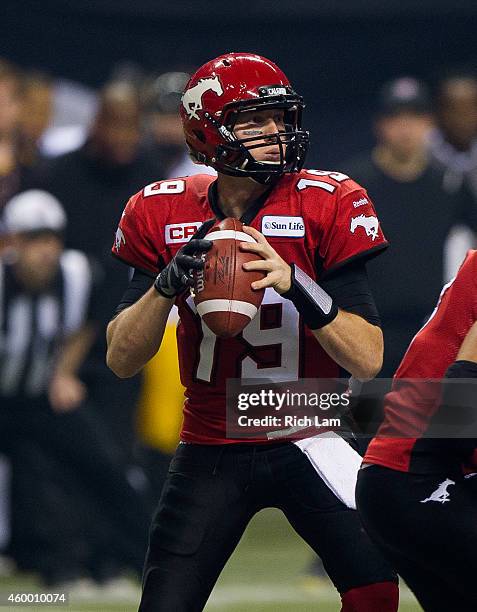 Bo Levi Mitchell of the Calgary Stampeders looks for a target during the 102nd Grey Cup Championship Game against the Hamilton Tiger-Cats at BC Place...