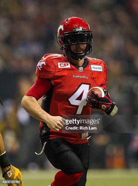Drew Tate of the Calgary Stampeders runs with the ball during the 102nd Grey Cup Championship Game against the Hamilton Tiger-Cats at BC Place...
