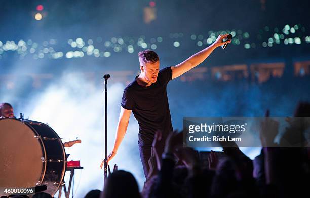 Dan Reynolds of Imagine Dragons perform during the half time of during the 102nd Grey Cup Championship Game between the Hamilton Tiger-Cats and the...