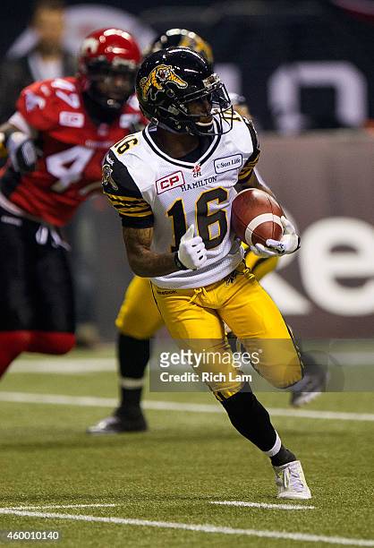Brandon Banks of the Hamilton Tiger-Cats runs with the ball during the 102nd Grey Cup Championship Game against the Calgary Stampeders at BC Place...