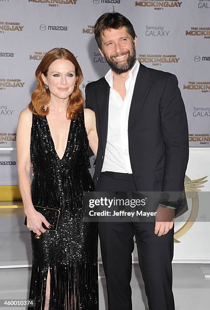 Actress Julianne Moore and husband Bart Freundlich arrive at the 'The Hunger Games: Mockingjay - Part 1' - Los Angeles Premiere at Nokia Theatre L.A....
