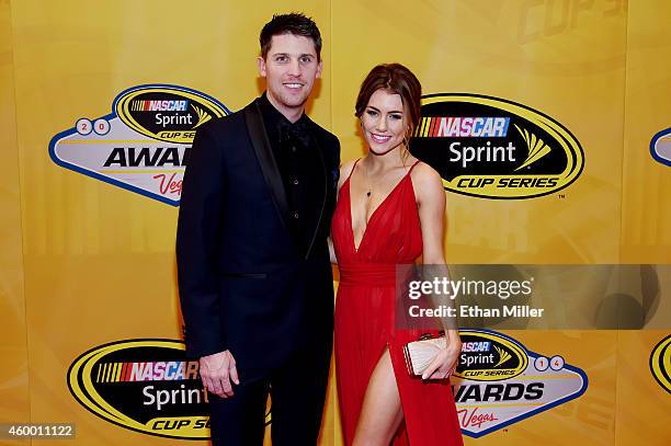 Denny Hamlin and his girlfriend Jordan Fish arrive on the red carpet prior to the 2014 NASCAR Sprint Cup Series Awards at Wynn Las Vegas on December...