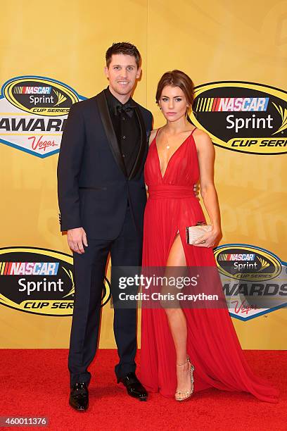 Denny Hamlin and his girlfriend Jordan Fish arrive on the red carpet prior to the 2014 NASCAR Sprint Cup Series Awards at Wynn Las Vegas on December...