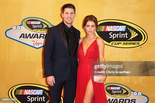 Denny Hamlin and his girlfriend Jordan Fish arrive on the red carpet prior to the 2014 NASCAR Sprint Cup Series Awards at Wynn Las Vegas on December...