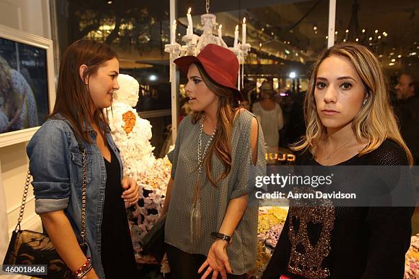 Victoria Chediak, Andrea Chediak and Adriana Castro attends Club Monaco opening on December 5, 2014 in Miami, Florida.
