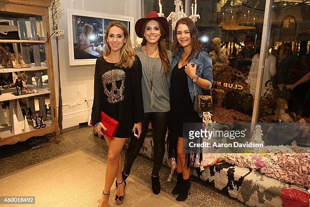 Victoria Chediak, Andrea Chediak and Adriana Castro attends Club Monaco opening on December 5, 2014 in Miami, Florida.