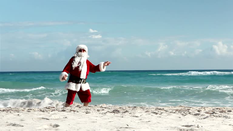https://media.gettyimages.com/id/460025778/video/crazy-santa-beach.jpg?b=1&s=640x640&k=20&c=SeTJjJJqUG2JvFxsuDX0UE0OrPqr-wBCrazXgMqSc_4=