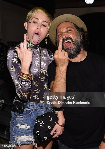 Singer/songwriter Miley Cyrus and Mr. Brainwash attend Haute Living presents Hublot Time Is Beautiful at the estate of JR and Loren Ridinger on...