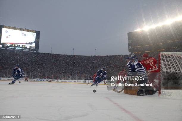 Goaltender Jonathan Bernier of the Toronto Maple Leafs makes a save in overtime against the Detroit Red Wings during the 2014 Bridgestone NHL Winter...