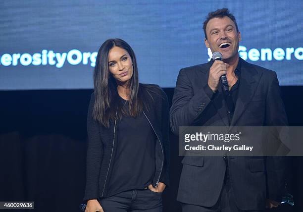 Actors Megan Fox and Brian Austin Green speak on stage at the 6th Annual Night of Generosity Gala presented by generosity.org at the Beverly Wilshire...