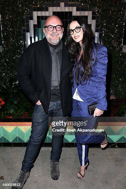 Eric Buterbaugh and Demi Moore attend the launch of Just One Eye's Ulysses Tier 1: The Ultimate Disaster Relief Kit on December 5, 2014 in Los...