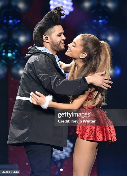 Recording artists The Weeknd and Ariana Grande perform onstage during KIIS FM's Jingle Ball 2014 powered by LINE at Staples Center on December 5,...