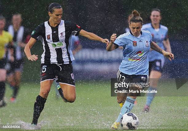 Trudy Camilleri of Sydney competes for the ball with Katherine Reynolds of the Jets during the round 12 W-League match between Sydney FC and...