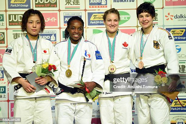 Haruka Tachimoto of Japan , Gevrise Emane of France , Kelita Zupancic of Canada and Laura Vargas Koch of Germany pose in the victory ceremony for...