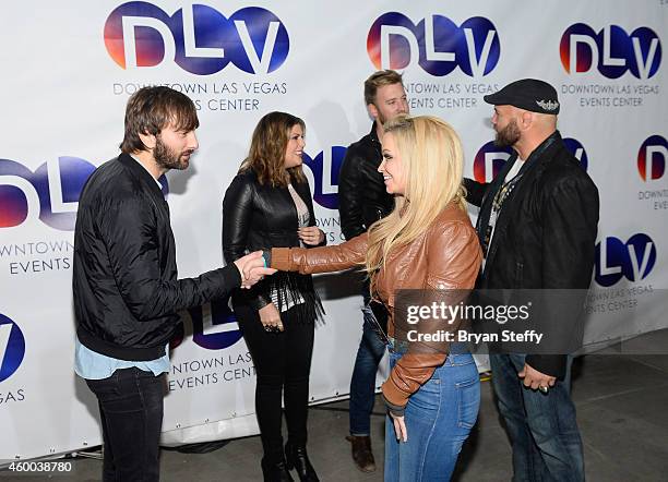 Recording artists Dave Haywood, Hillary Scott and Charles Kelley of Lady Antebellum and actor/MMA fighter Randy Couture and actress Mindy Robinson...