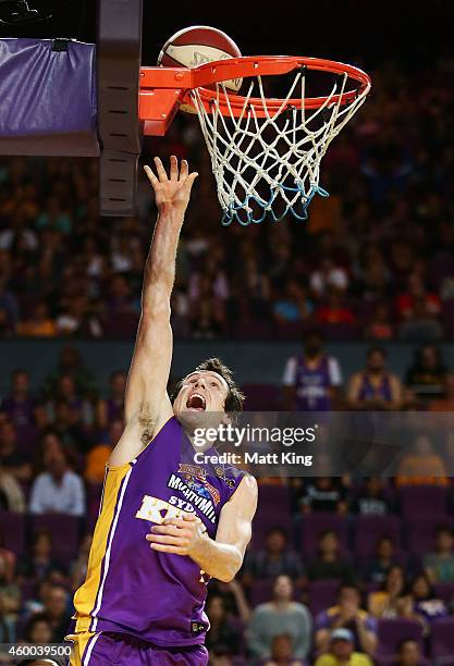 Ben Madgen of the Kings drives to the basket during the round nine NBL match between the Sydney Kings and the New Zealand Breakers at Qantas Credit...