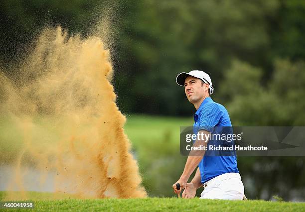 Ross Fisher of England plays from a bunker on the 2nd during the third round of the Nedbank Golf Challenge at the Gary Player Country Club on...