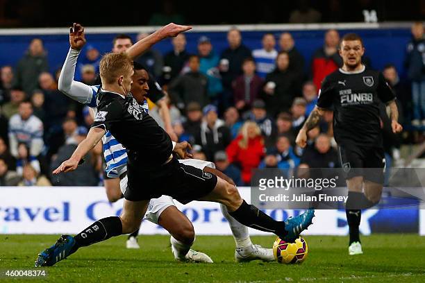 Leroy Fer of Queens Park Rangers scores the first goal during the Barclays Premier League match between Queens Park Rangers and Burnley at Loftus...