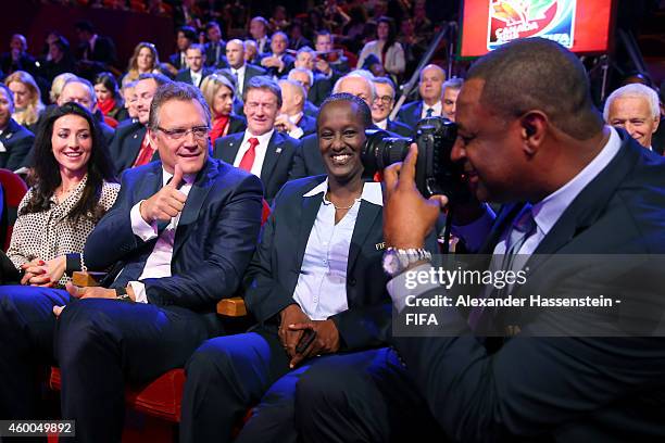 Jeffrey Webb , FIFA Vice-President and CONCACAF President takes pictures of FIFA Secretary General Jerome Valcke prior to the Final Draw for the FIFA...