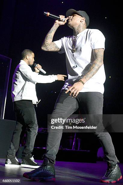 Trey Songz and Chris Brown perform during Power 106.1 Cali Christmas at The Forum on December 5, 2014 in Inglewood, California.