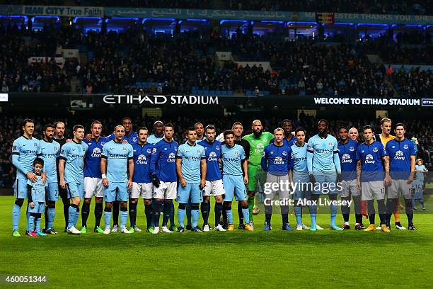 The opposing teams pose for the cameras as Football Remembers celebrates the 1914 Christmas Truce prior to kickoff in the Barclays Premier League...