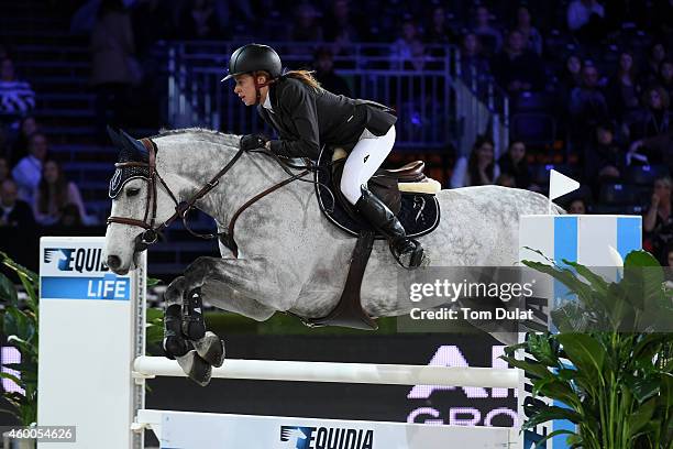 Second place finisher Marie Couperie from France rides B'NL' at Airbus Group Prize as part of the Gucci Paris Masters 2014 on December 6, 2014 in...