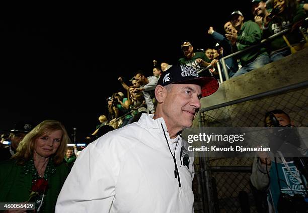 Michigan State Spartans head coach Mark Dantonio walks off the field after defeating the Stanford Cardinal 24-20 in the 100th Rose Bowl Game...