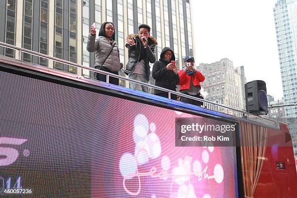 Jacob Latimore performs on top of a bus at HEELYS For The Holidays Charity Event at Madison Square Garden on December 6, 2014 in New York City.